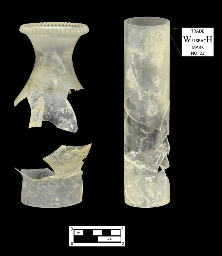 Kerosene lamp chimney (Cat # 4.24.372) and cylindrical chimney etched “Welsbach” (Cat # 4.24.389). 