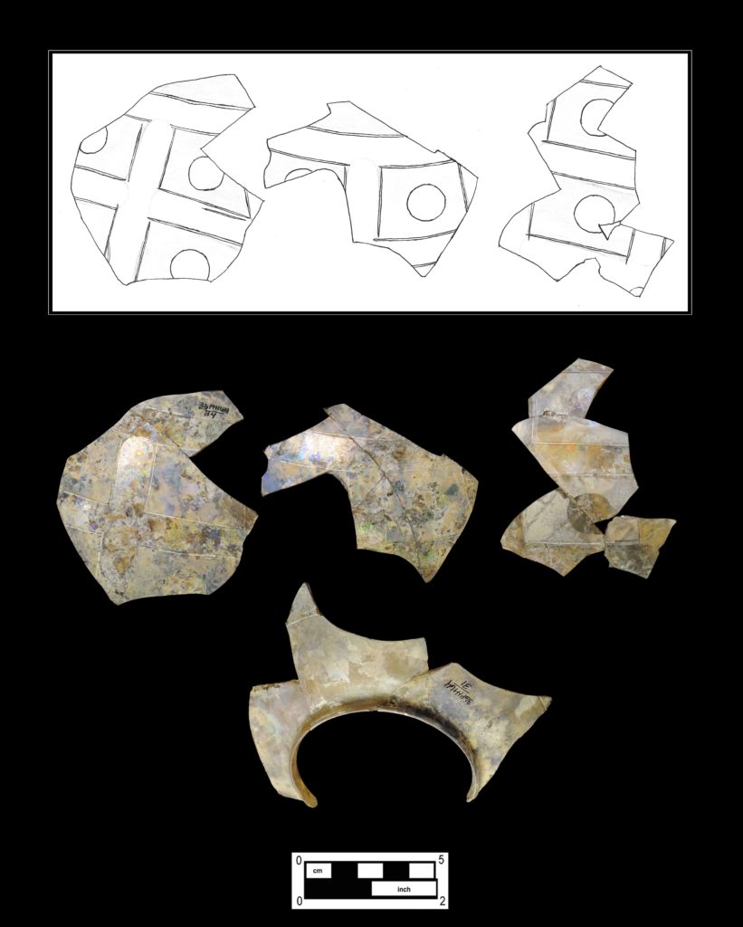 Thin globe fragments with a cut checkerboard pattern atop an overall etched surface (Cat # 4.29.84). (Inset: illustration showing details, by Katarzyna Madalinska).
