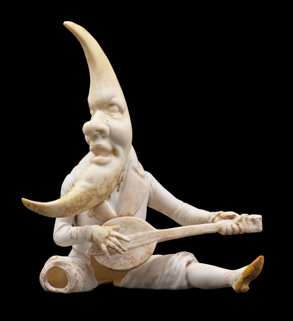 Bisque porcelain moon man figurine playing mandolin (Cat # 4.24.121).