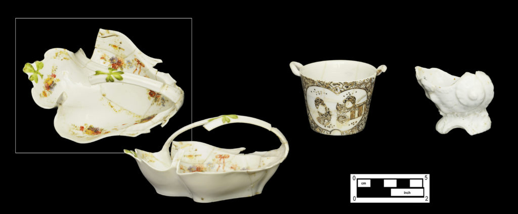 (Left to right) Leaf-shaped porcelain dish (two views) (4A-C-0033); Japanese porcelain container with enameled motif of children playing (4A-C-0027); small shell-shaped porcelain container (4A-C-0032).