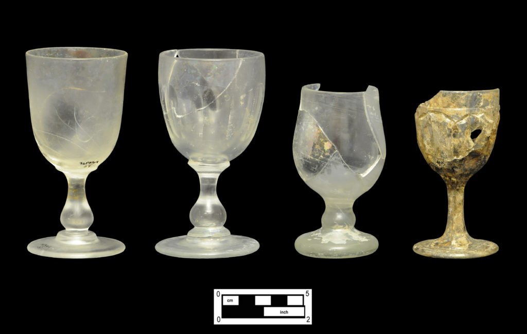 Assorted stemmed vessels: blown and molded forms (4A-G-285, 4A-G129, 4A-G-241); pressed cordial in Washington pattern (4A-G-284).