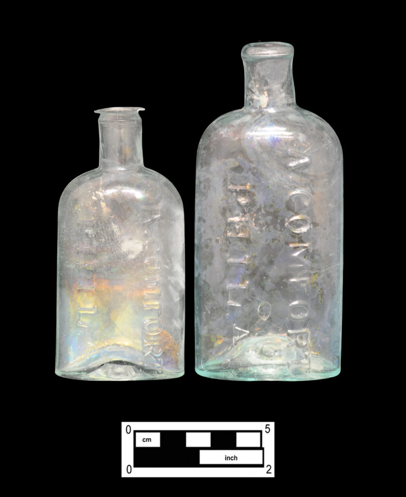1018 Palmer Street Druggist Bottles: Two Aaron Comfort bottle variants (left, 4A-G-0344 and right, 4A-G-0350)