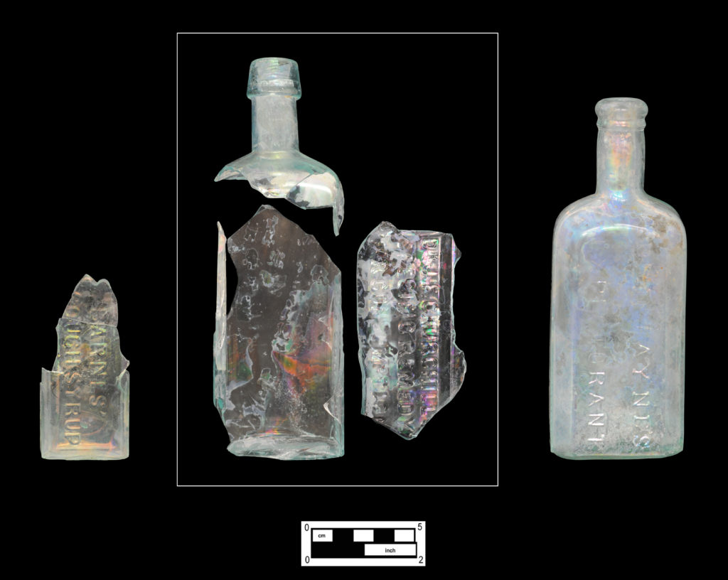 Patent/Proprietary Medicine Bottles for Treating Diseases of the Lungs: Barnes’ Cough Syrup bottle base/body fragment (left, 4.24.317), Dr. J. F. Churchill’s Specific Remedy for Consumption bottle fragments (center, all from same bottle, 4A-G-0313), and Dr. D. Jayne’s Expectorant Bottle (right, 4A-G-0147)