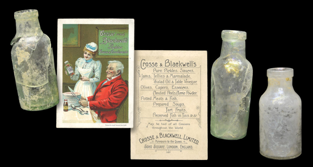 Two pale green Crosse & Blackwell food bottles (4A-G-0358, left, and 4A-G-0288, right) shown with a Cross & Blackwell trade card (not shown to scale). The colorless bottle at far right (4A-G-0034) is of the same style but does not bear any identifying embossing.